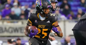 E C U Football Player Running With Ball Wallpaper