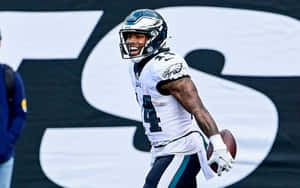 Eagles Player Celebratingon Field Wallpaper