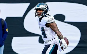 Eagles Player Celebratingon Field Wallpaper