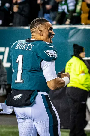 Eagles Quarterback Hurts In Action Wallpaper