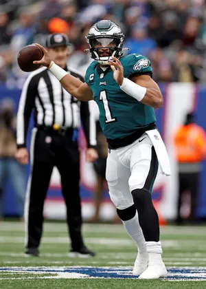 Eagles Quarterback Jalen Hurts In Action Wallpaper