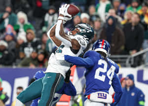 Eagles Receiver Catch Against Giants Defense Wallpaper