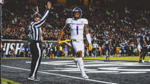 East Carolina Player Touchdown Celebration Wallpaper