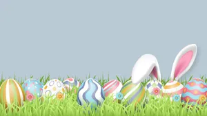 Easter Eggs In Grass With Bunny Ears Wallpaper
