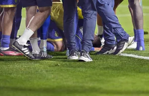 Ecstatic Soccer Player Celebrating Goal Wallpaper