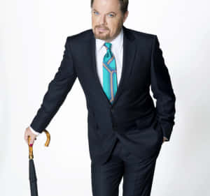 Eddie Izzard Performing Live On Stage Wallpaper