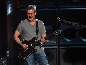 Eddie Van Halen With Black Guitar Wallpaper