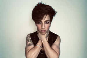 Edgy Portraitwith Tattoosand Piercings Wallpaper