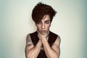 Edgy Portraitwith Tattoosand Piercings Wallpaper