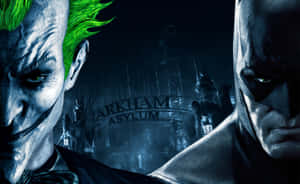 Eerie Arkham Asylum Illuminated At Night Wallpaper