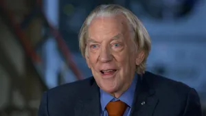 Elderly Actorin Blue Suit Wallpaper