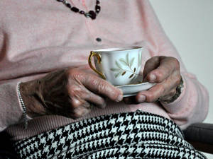 Elderly Woman Tea Wallpaper