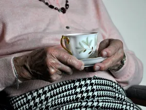 Elderly Woman Tea Wallpaper