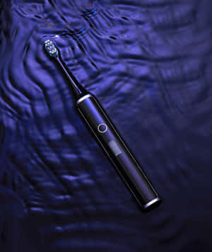 Electric Toothbrush Water Reflections Wallpaper
