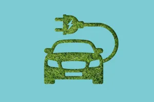 Electric Vehicle Cruising On The Street Wallpaper