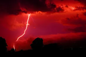 Electric Vitality - Vibrant Red Lightning Wallpaper