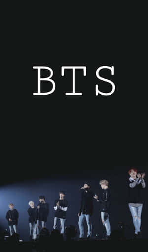 Electrifying Bts Performance On Stage Wallpaper