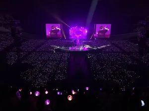 Electrifying Bts Stage Performance With Vibrant Lights Wallpaper