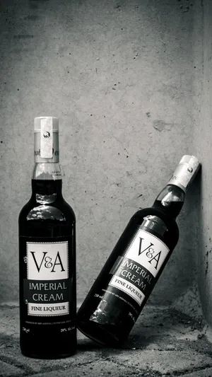 Elegance In A Glass: Monochrome Shot Of Imperial Cream Alcohol Wallpaper