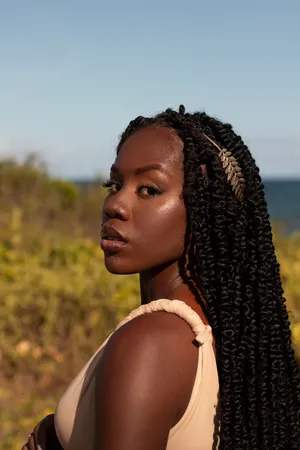 Elegant African Woman Outdoors Wallpaper