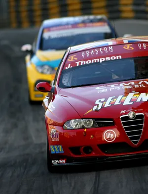 Elegant Alfa Romeo 156 On Outdoor Display Wallpaper
