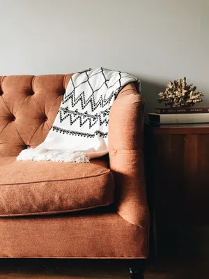 Elegant And Neat Brown Leather Couch Wallpaper