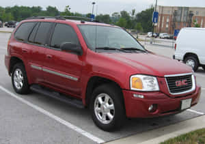 Elegant And Powerful Gmc Envoy In A Striking Pose Wallpaper