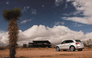 Elegant Audi Q5 In Motion Wallpaper