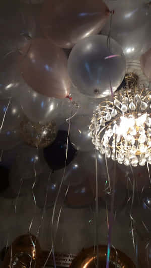 Elegant_ Balloons_and_ Chandelier_ Celebration Wallpaper