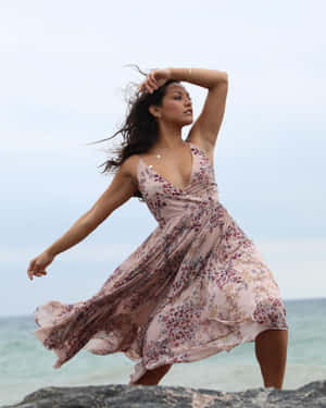 Elegant Beachside Pose Wallpaper