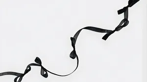 Elegant Black Ribbon Bow Wallpaper