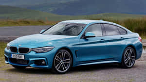 Elegant Bmw 4 Series Cruising The Streets Wallpaper