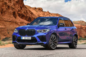 Elegant Bmw X5 In Striking Scenery Wallpaper