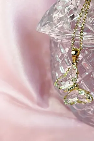 Elegant Butterfly Pendant Jewelry Wallpaper