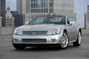 Elegant Cadillac Xlr On The Road Wallpaper