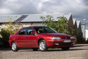 Elegant Citroen Xantia In Front Of A Sunset Wallpaper