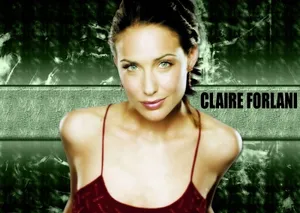 Elegant Claire Forlani Posing In A Beautiful Gown Wallpaper