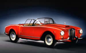 Elegant Classic - The Lancia Aurelia In Pristine Condition Wallpaper
