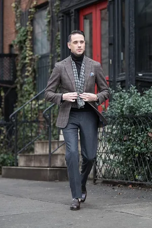 Elegant Dapper Man Walking Wallpaper