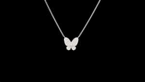 Elegant Diamond Butterfly Pendant Wallpaper