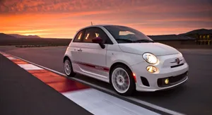 Elegant Fiat Cinquecento: A Blend Of Style And Comfort Wallpaper