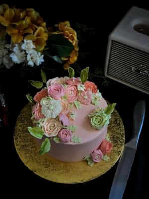 Elegant Floral Cake With Fresh Blooms Wallpaper