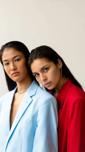 Elegant Gentleman In Double-breasted Pastel Suit Wallpaper