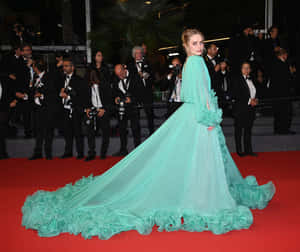 Elegant Green Gown Red Carpet Wallpaper