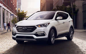 Elegant Hyundai Santa Fe On Stunning Scenery Background Wallpaper