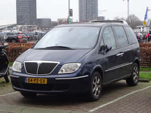 Elegant Lancia Phedra In Landscape Wallpaper