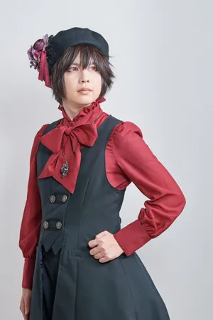 Elegant Lolita Fashionista Showcasing A Classic Dress Wallpaper