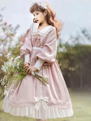 Elegant Lolita Girl In A Beautiful Pastel Dress Wallpaper