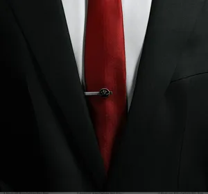 Elegant Man Wearing Luxurious Red Tie Wallpaper