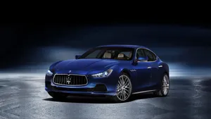 Elegant Maserati Ghibli On The Road Wallpaper